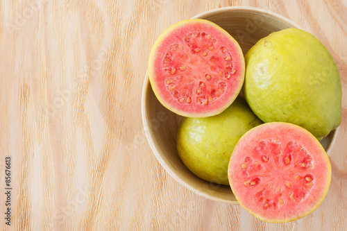 Fresh goiaba on wooden table photo