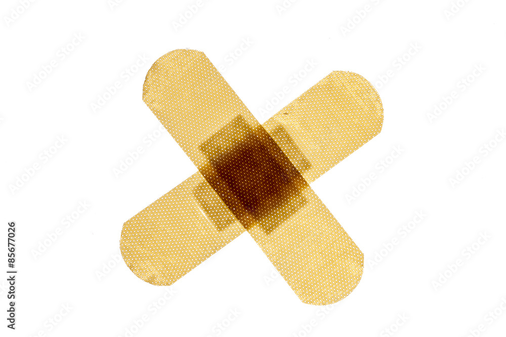 Patch in cross shape, isolated on white background Patch in cross shape, isolated on white background