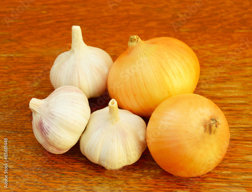 several heads of garlic and onions