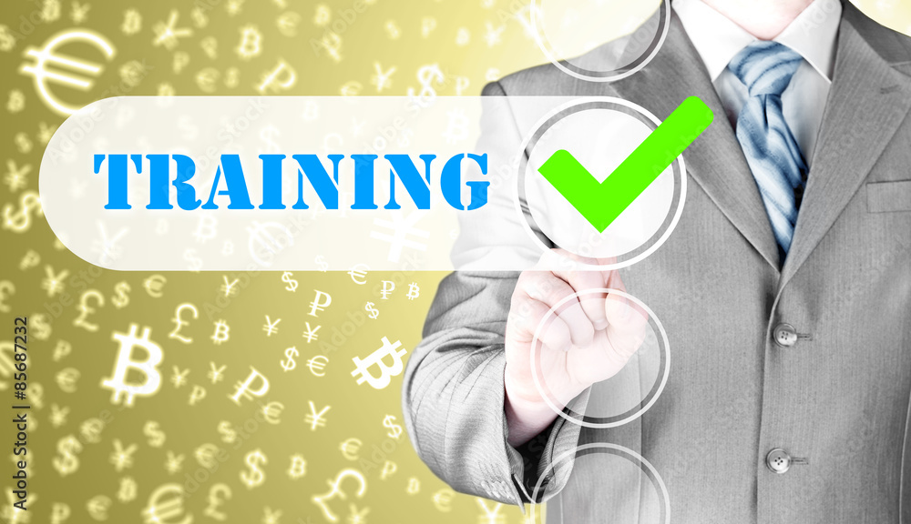 Businessman pressing touch screen interface training checkbox Businessman pressing touch screen interface training checkbox