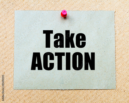 Take Action written on paper note photo