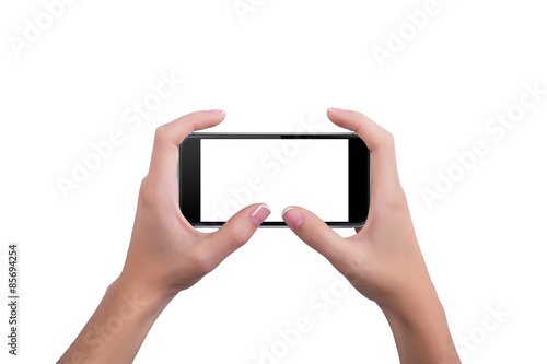 Girl holding the phone with both hands