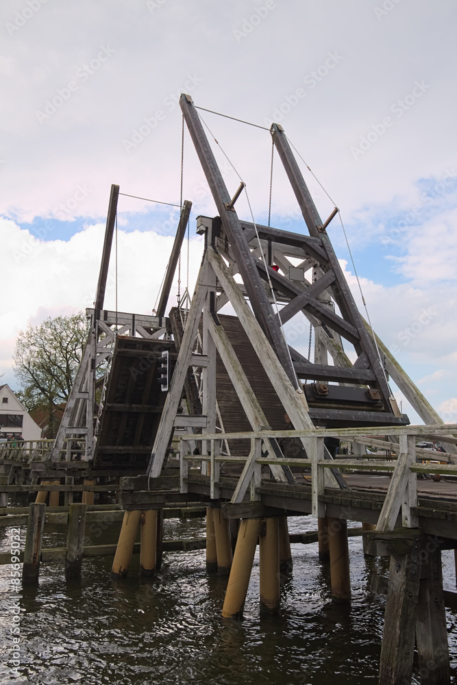 Movable wood bridge in Wieck near Greifswald, Mecklenburg-Vorpommern, Germany Movable wood bridge in Wieck near Greifswald, Mecklenburg-Vorpommern, Germany