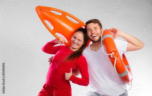 lifeguard couple with rescue equipment