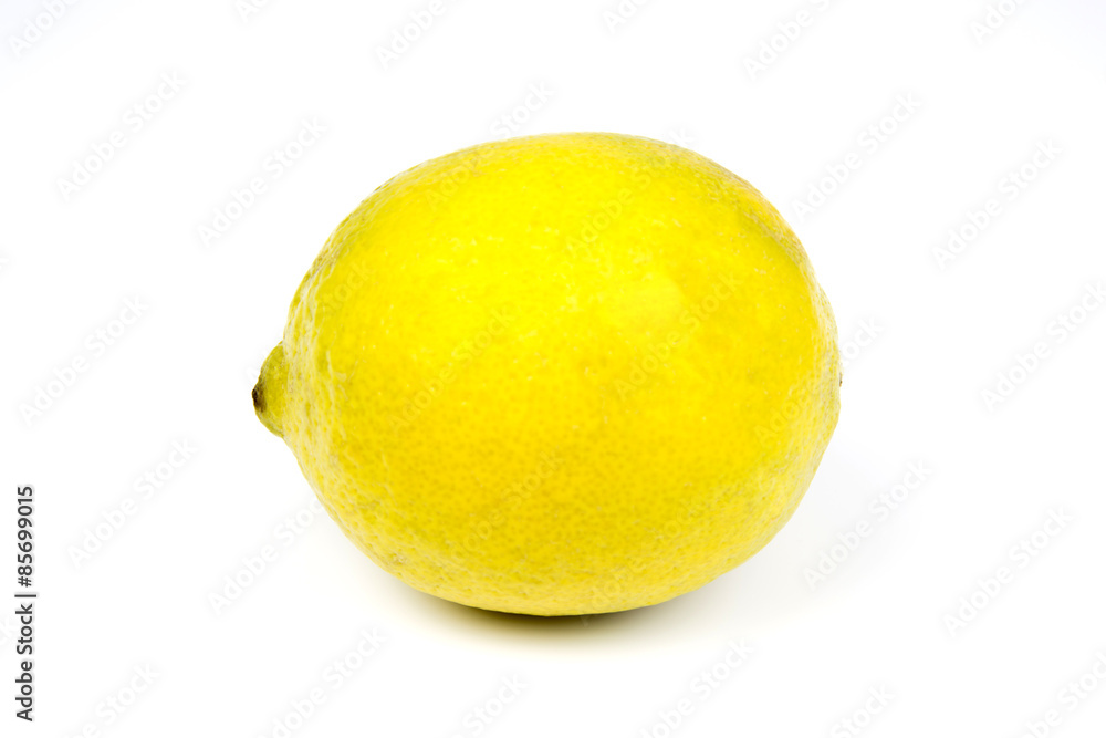 A bright fresh yellow lemon on a white studio background A bright fresh yellow lemon on a white studio background