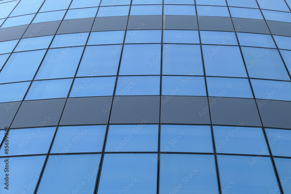  Reflection in windows of modern office building