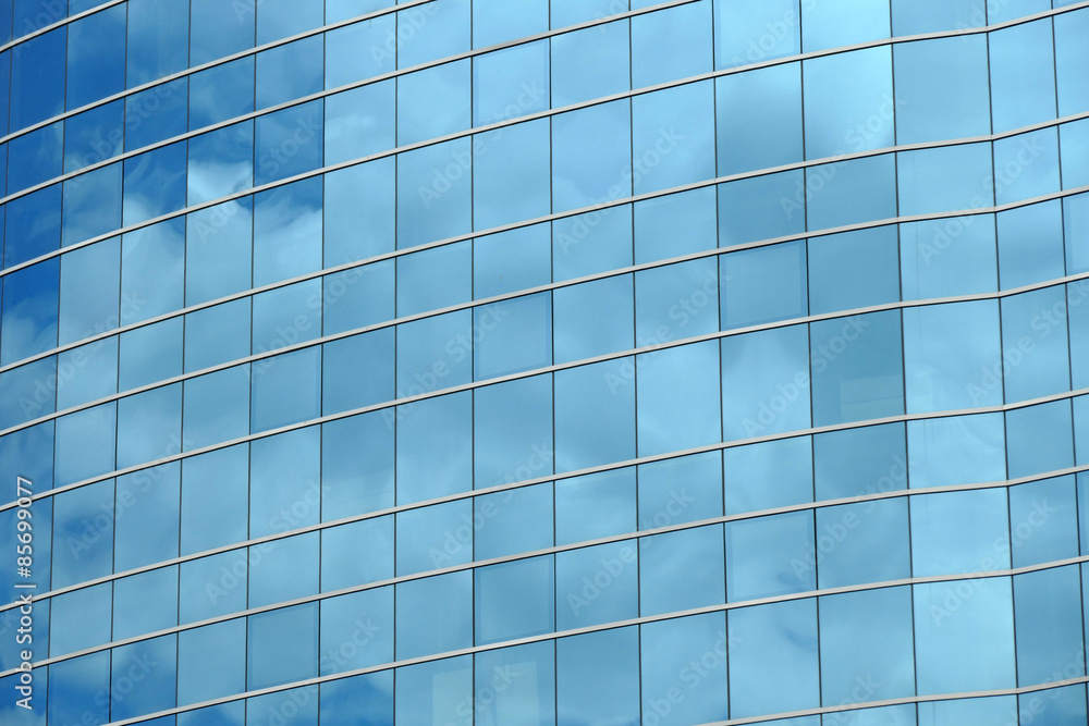 Reflection in windows of modern office building Reflection in windows of modern office building