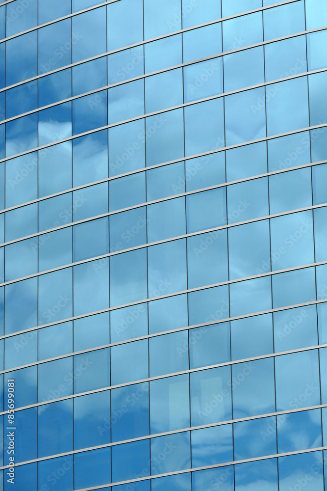 Reflection in windows of modern office building Reflection in windows of modern office building