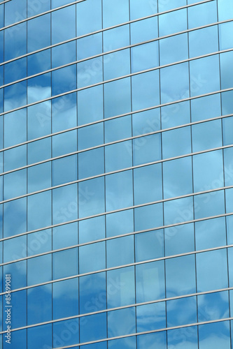 Reflection in windows of modern office building