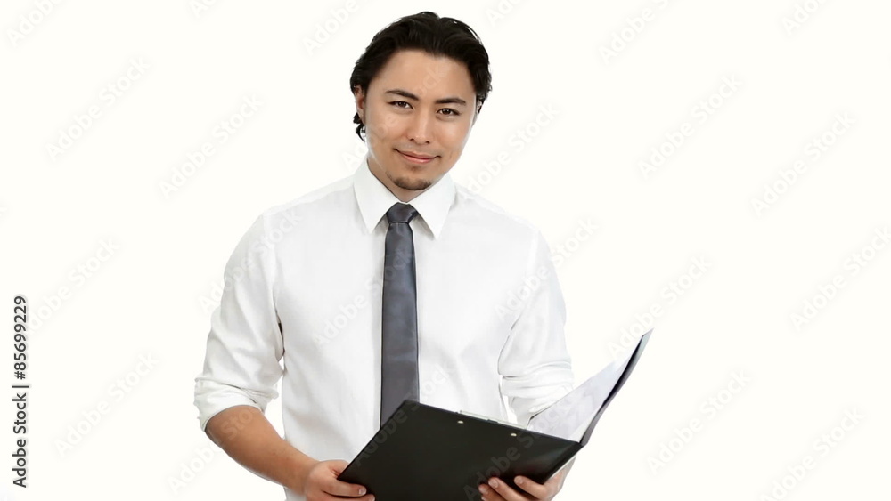Attractive businessman holding a folder wearing a shirt Attractive businessman holding a folder wearing a shirt