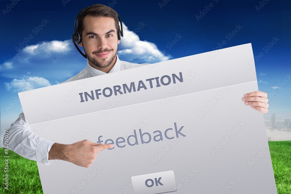 Businessman with headphone showing sign to camera Businessman with headphone showing sign to camera