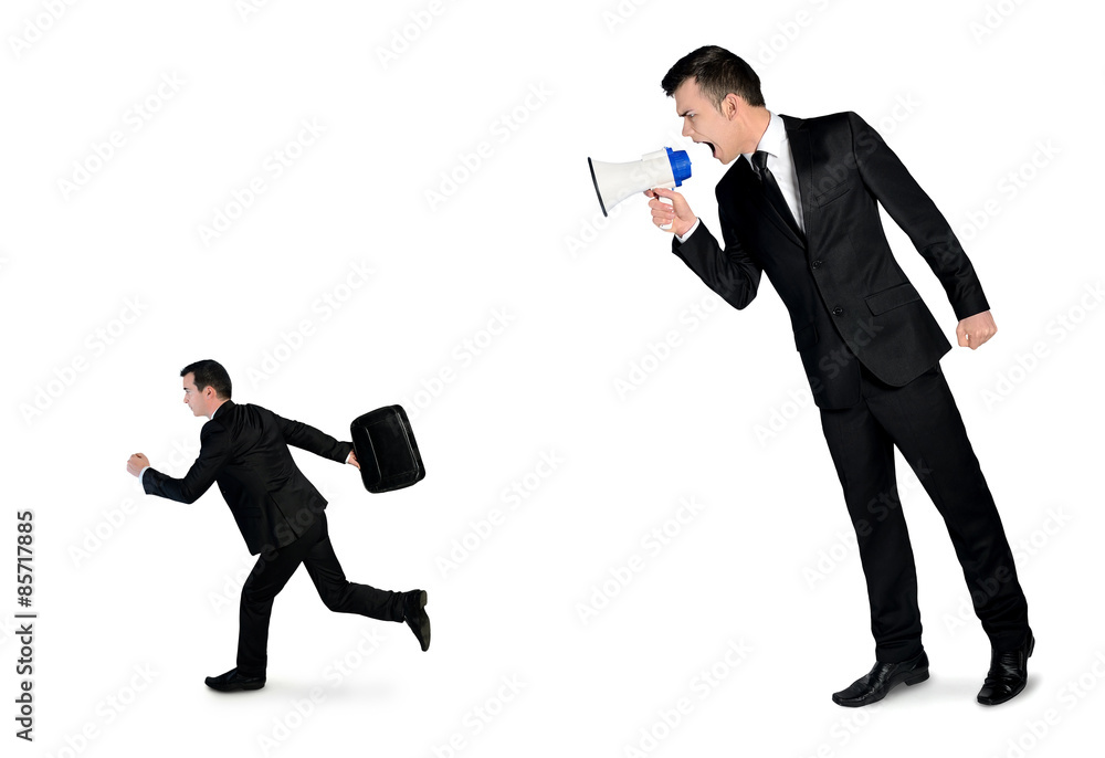 Business man screaming on megaphone