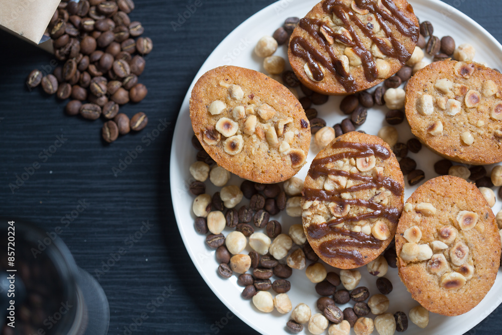 Plate of hazelnut and coffee cakes Plate of hazelnut and coffee cakes
