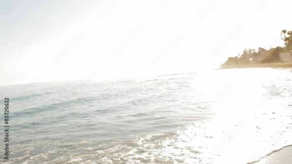 young couple running on the beach young couple running on the beach