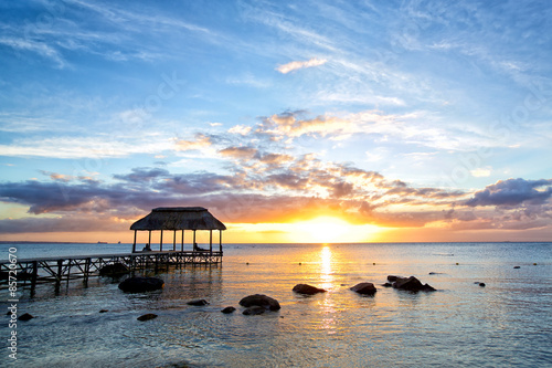 Beautiful sunset with jetty in Mauritius Island