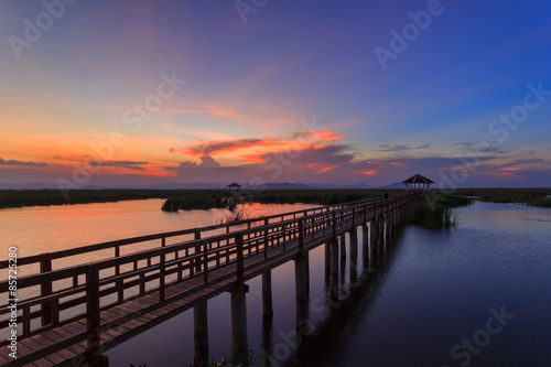 Wooden Bridge in lotus lake on sunset time at Khao Sam Roi Yot National Park, Thailand © Southtownboy Studio