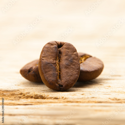 Coffee beans on old table - close up shot