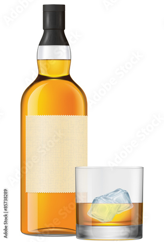 A bottle and a glass of whisky on rocks. 