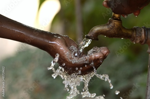 Climate Change Symbol: Handful Of Water Scarsity for Africa Symbol photo