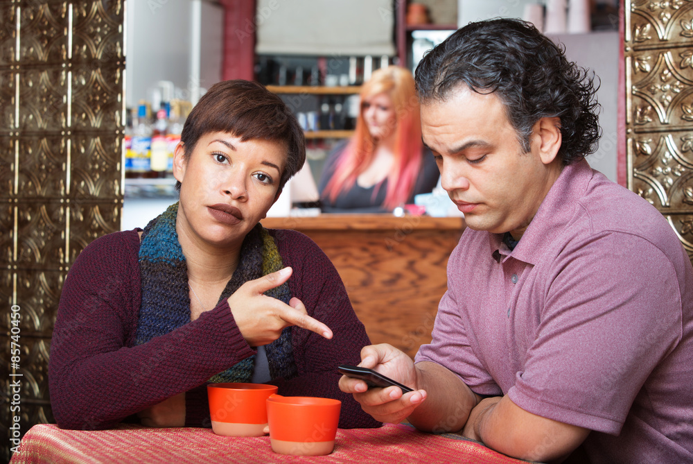 Woman Pointing at Cell Phone Woman Pointing at Cell Phone