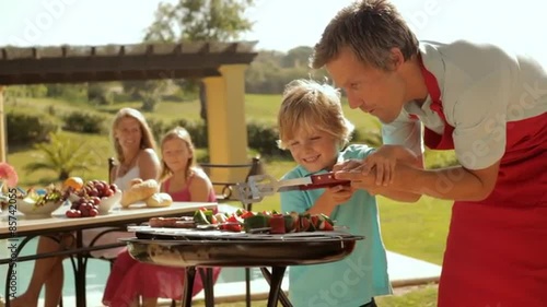 dolly shot of family barbecue