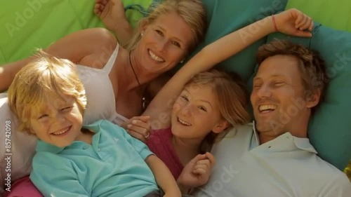 family on garden hammock