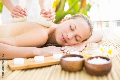 Attractive woman getting massage on her back