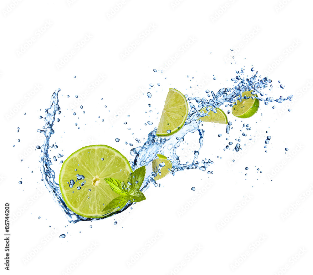 Fototapeta premium Fresh lime in water splash on white background