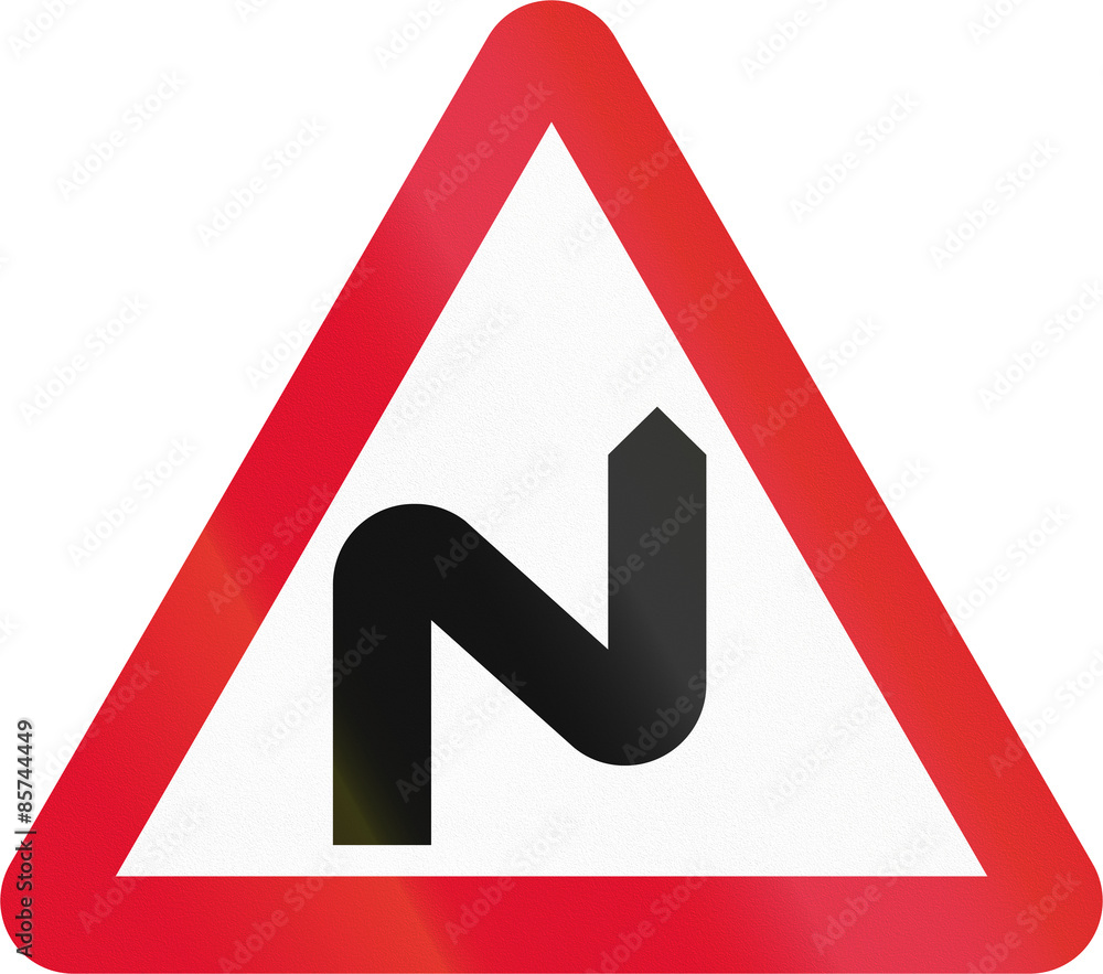 Hong Kong sign warning about a double curve first to right Hong Kong sign warning about a double curve first to right