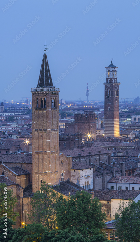 two towers in twilights in Verona in Italy