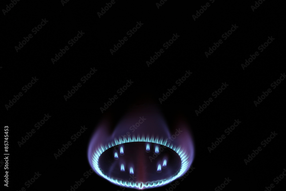 Burning gas burner flame in the dark mystic romance Burning gas burner flame in the dark mystic romance