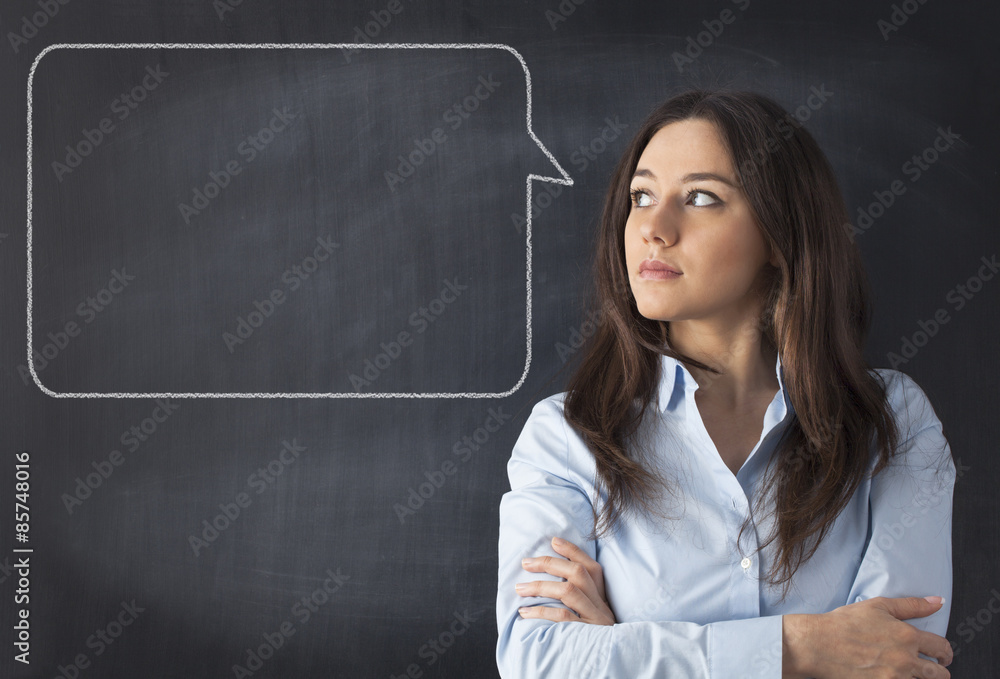 Young woman thinking with blackboard Young woman thinking with blackboard
