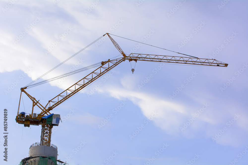Tower cranes are a modern form of balance crane that used in the construction of tall buildings.
