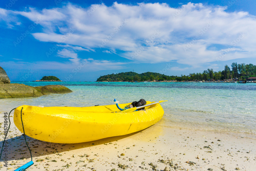 Yellow kayak on the sea. Kayaking on island Yellow kayak on the sea. Kayaking on island