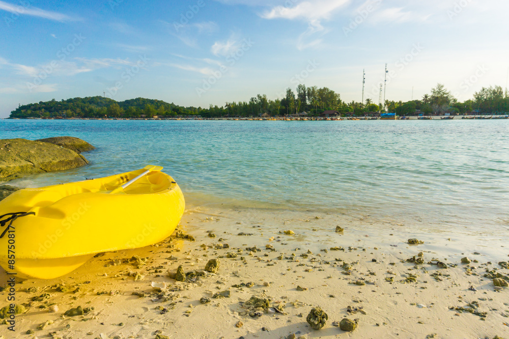 Yellow kayak on the sea. Kayaking on island Yellow kayak on the sea. Kayaking on island