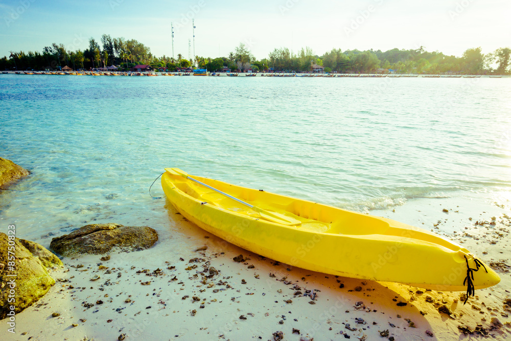 Yellow kayak on the sea. Kayaking on island Yellow kayak on the sea. Kayaking on island