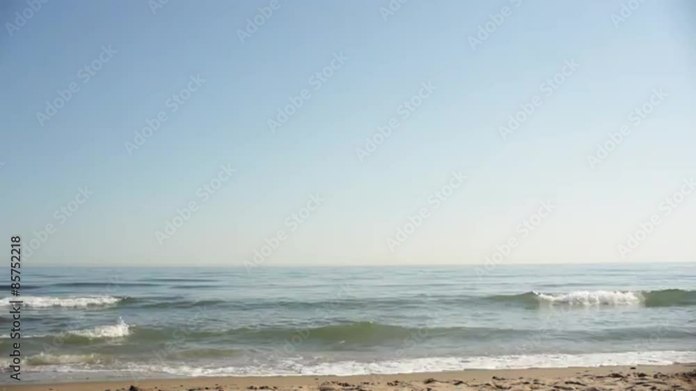 Young couple running on beach Young couple running on beach