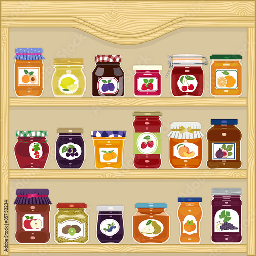 Jars of homemade jam with labels in the cupboard