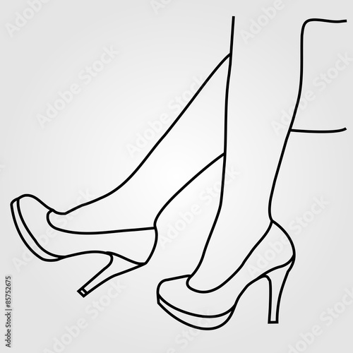 the legs of a woman wearing high heels
