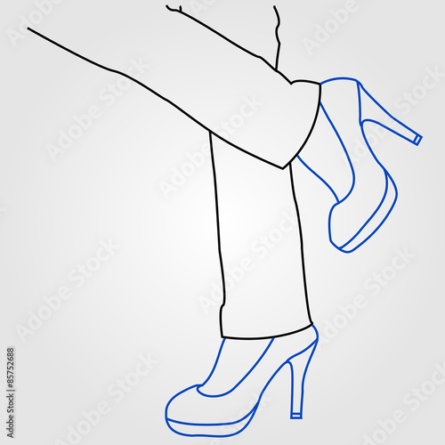 the legs of a woman wearing high heels 