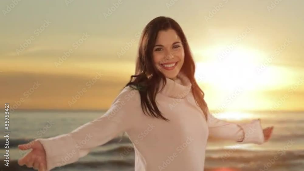 dolly shot of young woman walking by sea dolly shot of young woman walking by sea