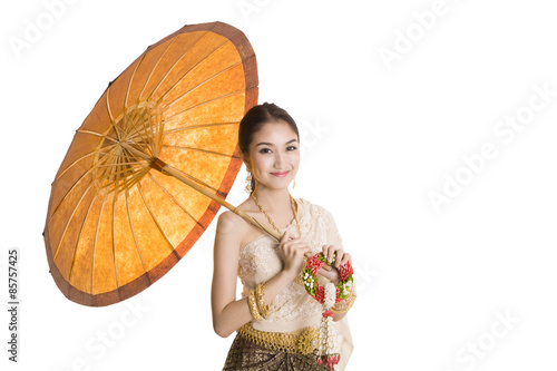 Photography Thai woman dressing traditional costume holding an umbrella