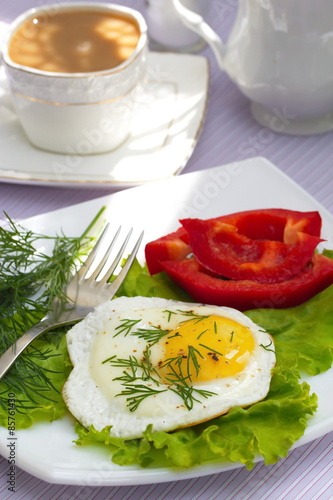 Fried eggs with vegetables and coffee for your breakfast