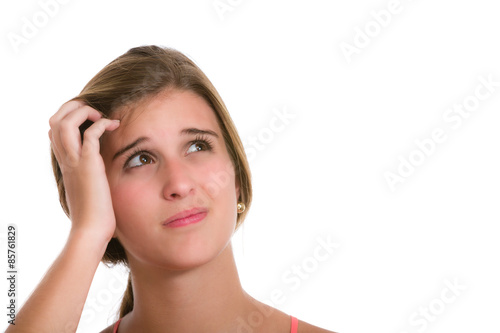 Confused or concern Hispanic Young woman scratching head. Image isolated on white background.