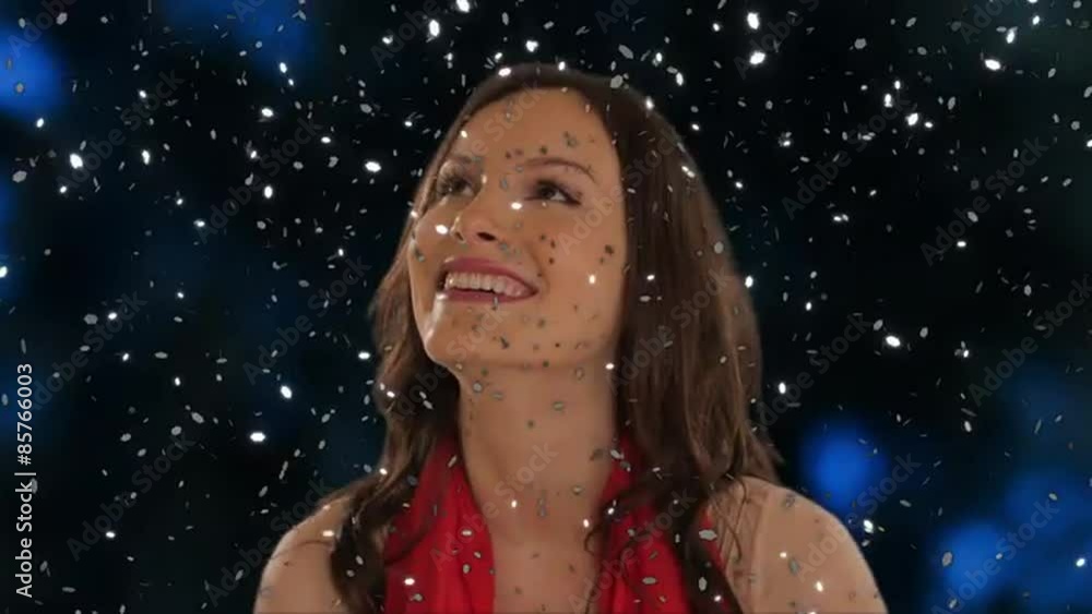 dolly shot of young girl with falling sparkles dolly shot of young girl with falling sparkles