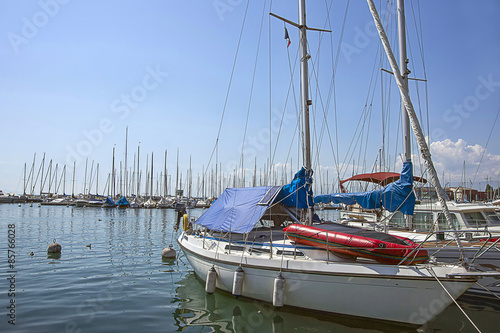 Boats in marina in Geneva lake bay harbor in Lausanne, Switzerla