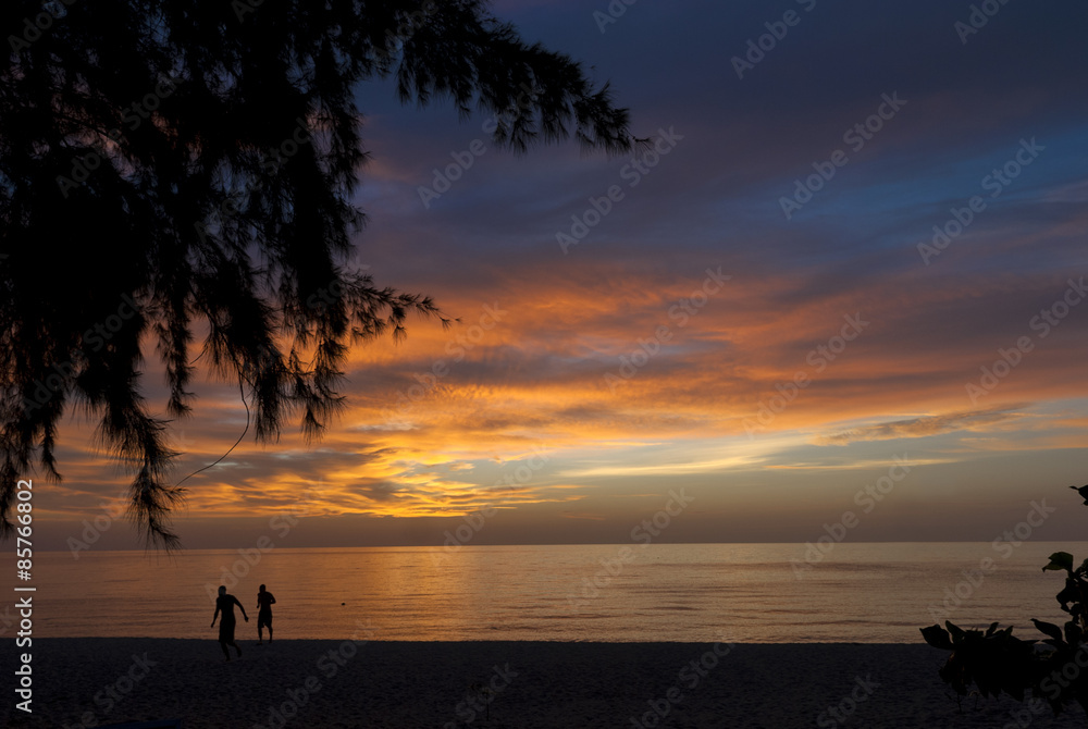 Fototapeta premium Thailand,Koh Phangan Island Sunset men walking