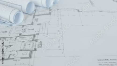 Flat and Rolled House Plans Close Up Dolly Slide