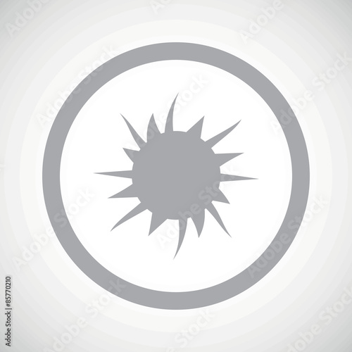 Grey starburst sign icon