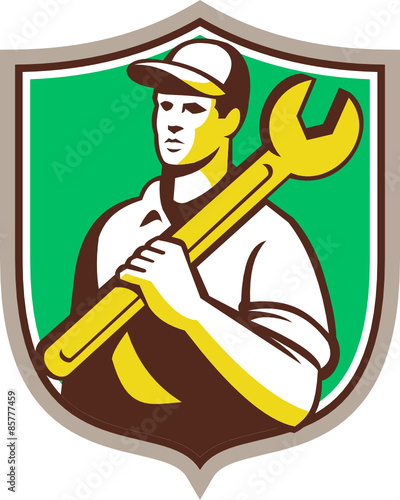 Mechanic Worker Holding Spanner Shield Retro